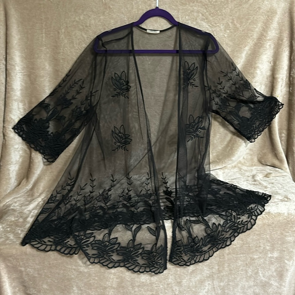 Jacket sheer black. Sz L. Maurice’s. 3/4 sleeves. Emb detail.